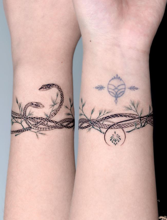 Duo snake bracelet tattoo 