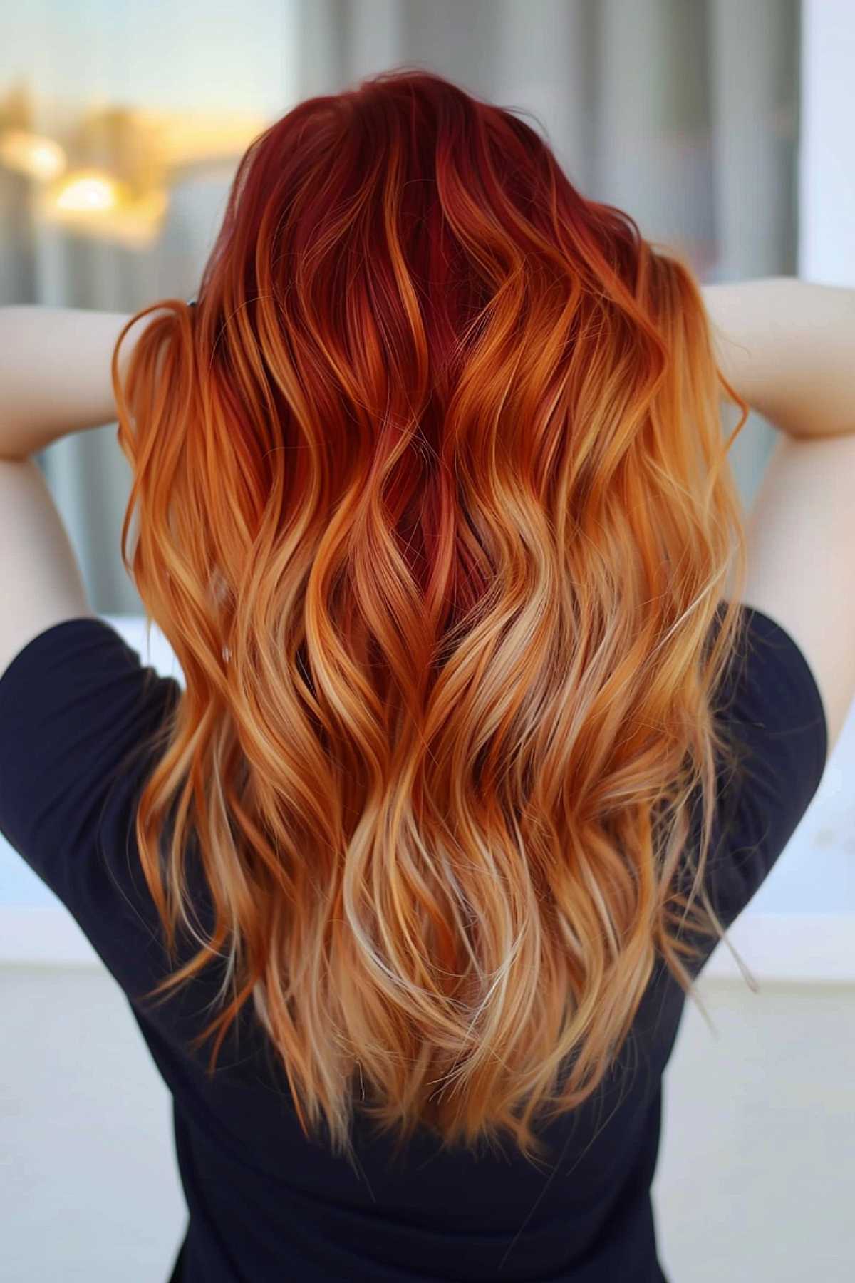 Shaded hair showing reddish top and coppery blond tips