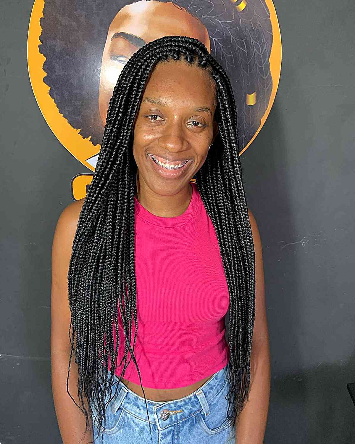 Very long, thick, knotless black braids with finer tips